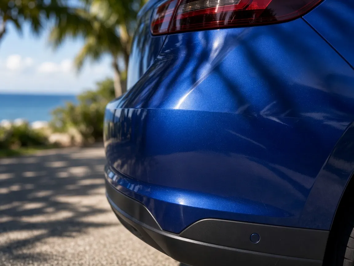 After: bumper repaired, flawless blue paint